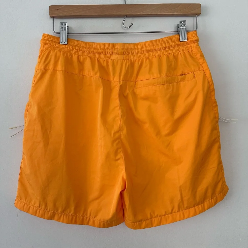 Kith mens Team USA Ring Swim Shorts in the Midsummer‎ orange color. Size small